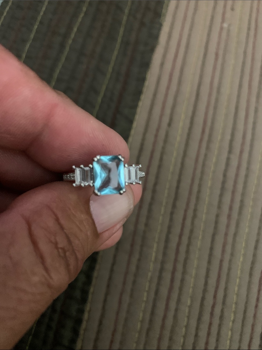 Blue Topaz/Sterling Silver Ring with Accent Stones

Size 7